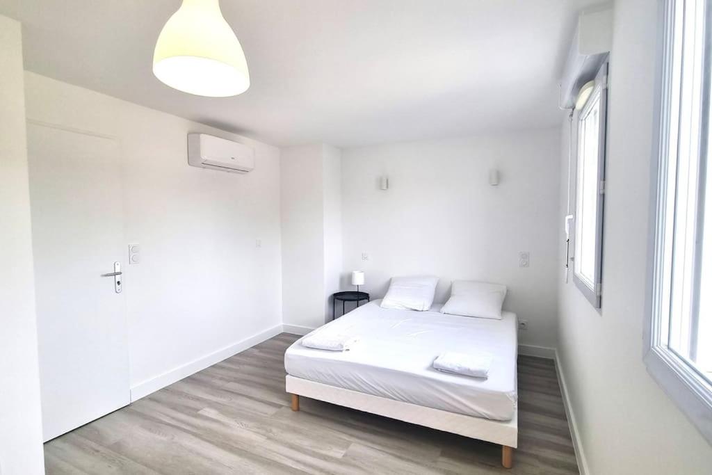 Postel nebo postele na pokoji v ubytování Résidence Anthérieu - Appartements neufs tout confort
