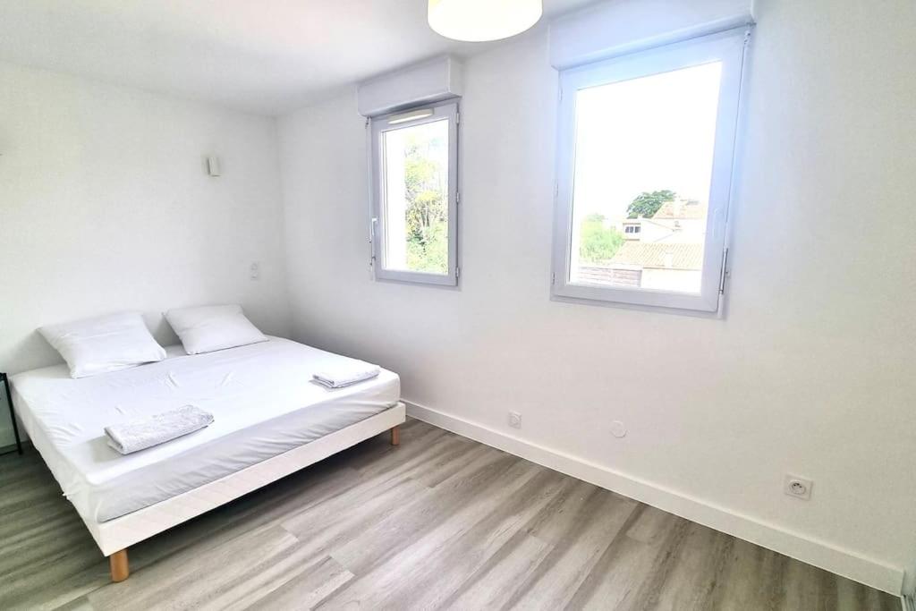 Postel nebo postele na pokoji v ubytování Résidence Anthérieu - Appartements neufs tout confort