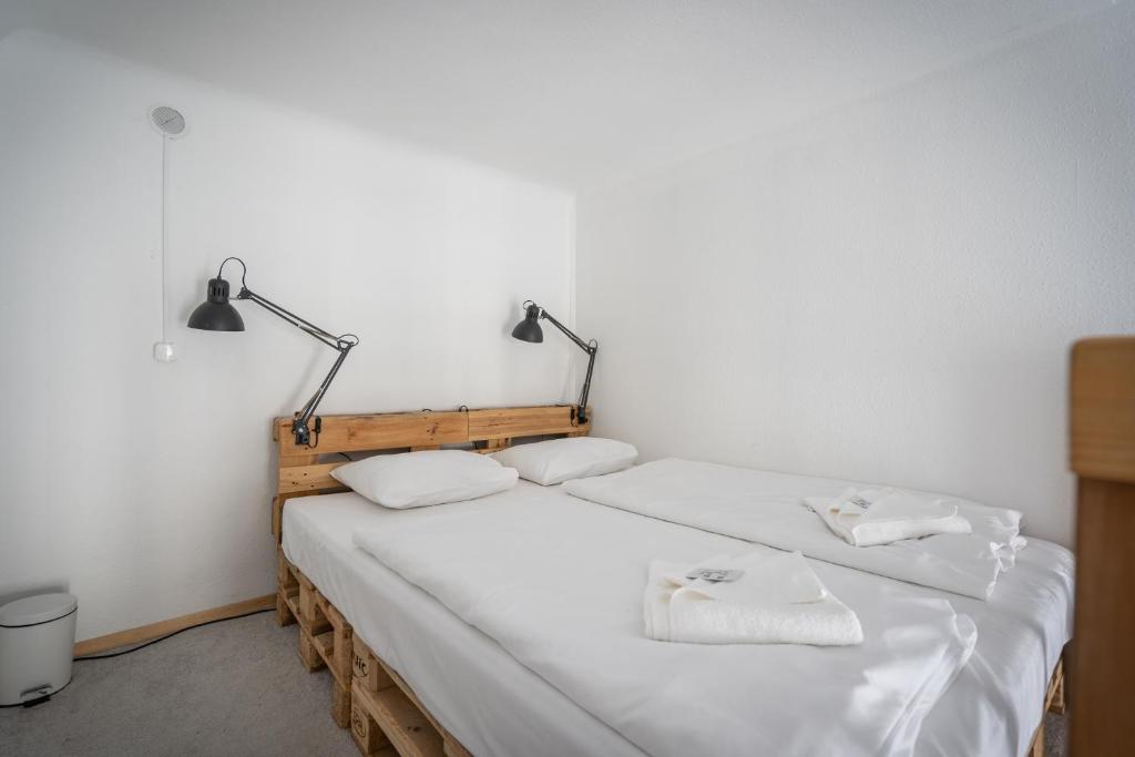 Posteľ alebo postele v izbe v ubytovaní Retro Rebel Mode Apartment