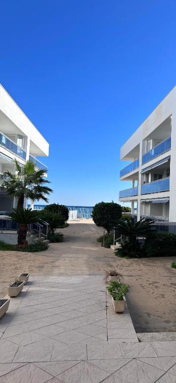 an empty parking lot in front of a large building at Mont-Roig Del Camp in Tarragona