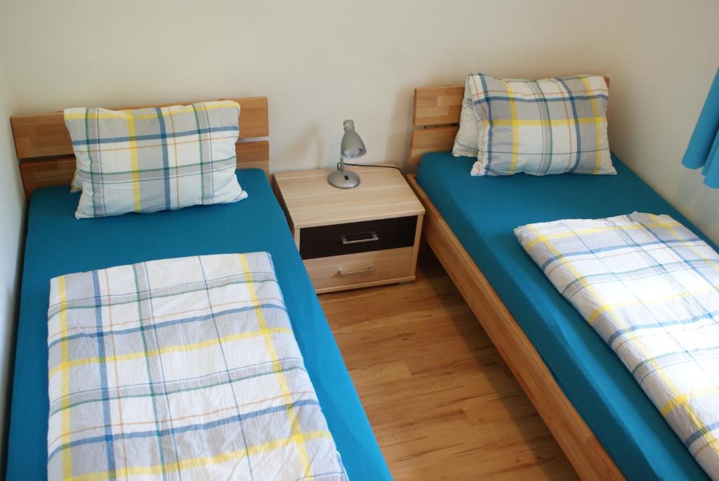 Postel nebo postele na pokoji v ubytování Appartementhaus Monika