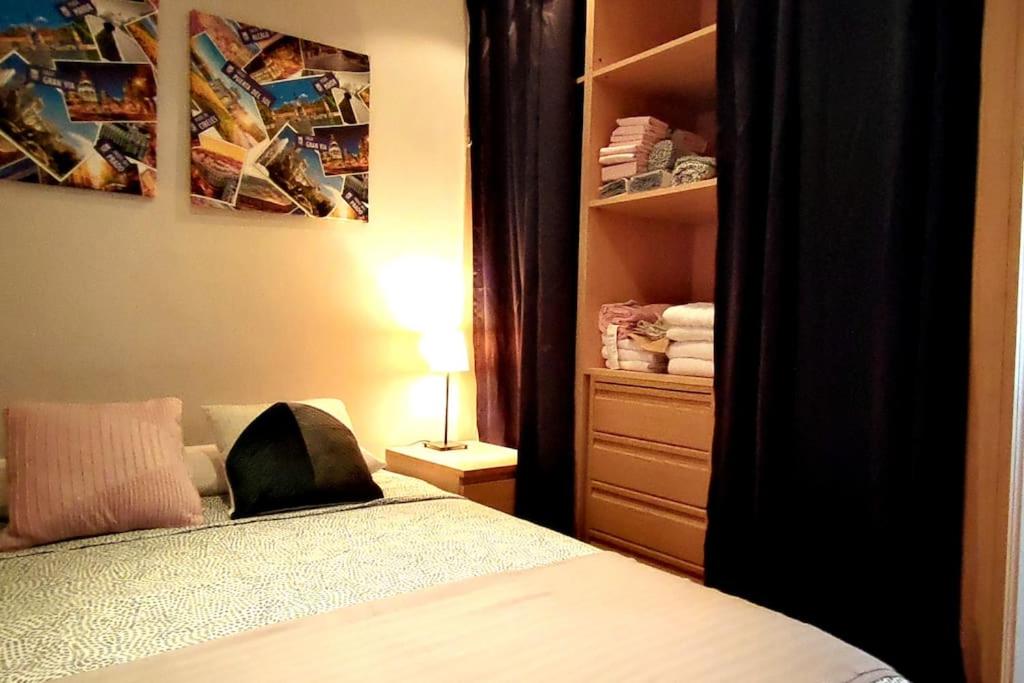 Postel nebo postele na pokoji v ubytování Estudio Lavapiés cerca de Antón Martín