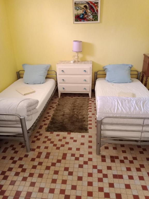 Posteľ alebo postele v izbe v ubytovaní Maison entière Garage et parking