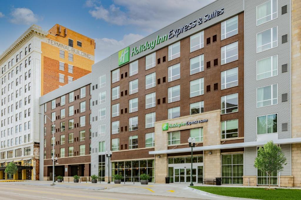 a large building with a sign on the side of it at Holiday Inn Express & Suites - Lincoln Downtown , an IHG Hotel in Lincoln