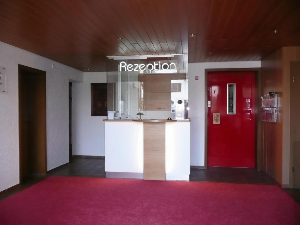 Kuchyň nebo kuchyňský kout v ubytování Hotel Rebstock
