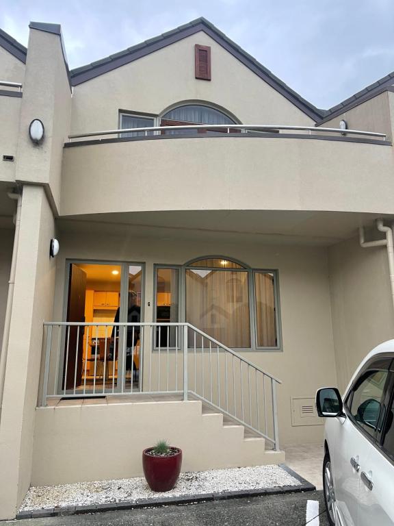 a house with a car parked in front of it at BPS apartment 3 in Taupo