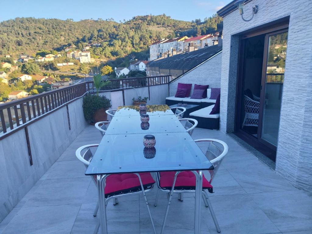 Balkón nebo terasa v ubytování Duplex grandes cristaleras impresionantes vistas