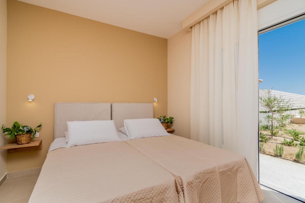 Posteľ alebo postele v izbe v ubytovaní Spartakos Luxury Villa 1