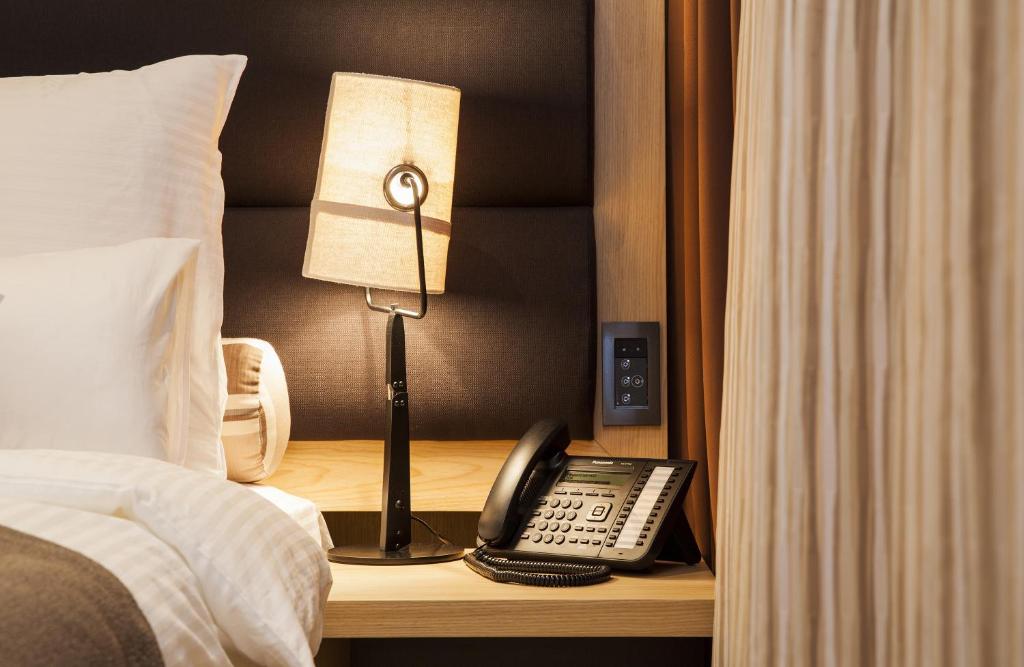 Postel nebo postele na pokoji v ubytování Atera Business Suites