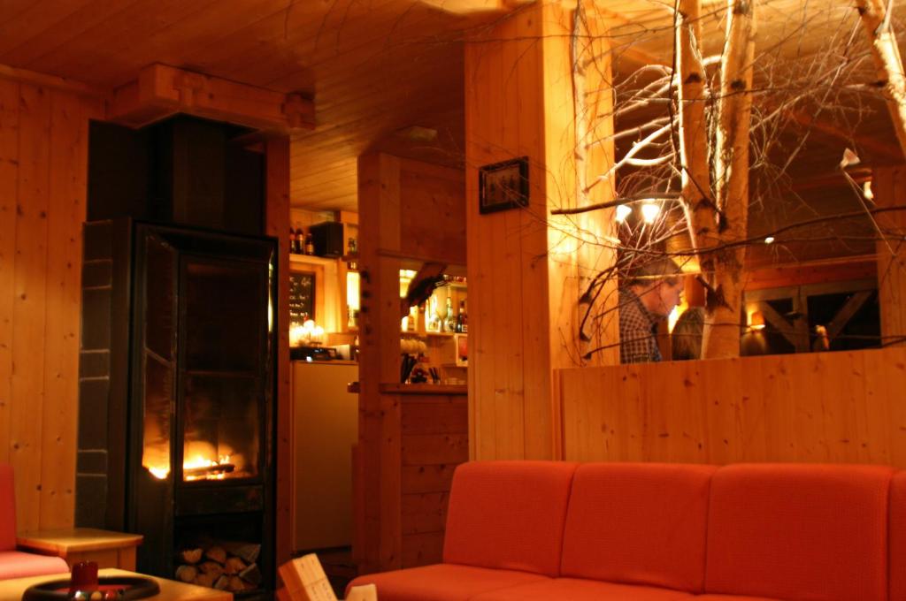 Posezení v ubytování Hotel Les Lans