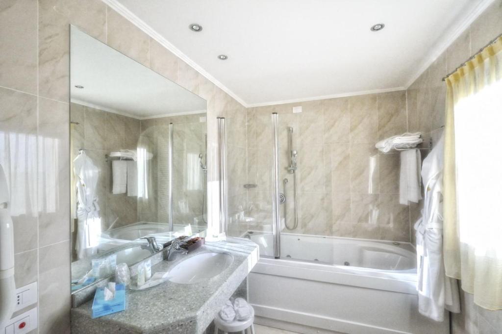 Koupelna v ubytování Noventa Hotel