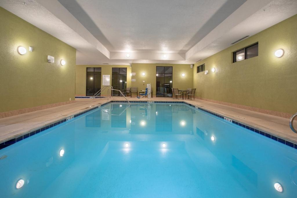 a large swimming pool in a hotel room at Holiday Inn & Suites Durango Downtown by IHG in Durango