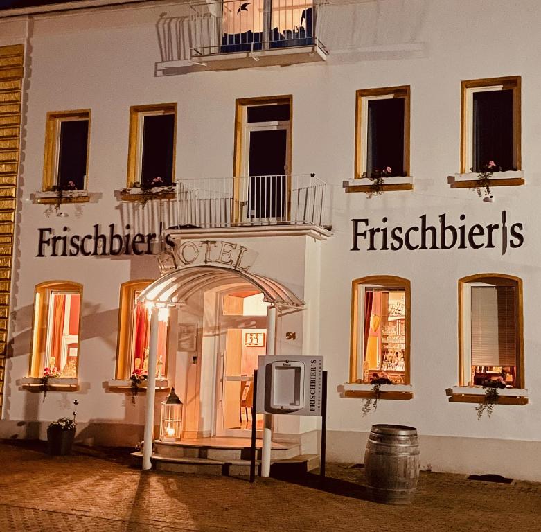 a building with a tv in front of it at Frischbier's Gästezimmer in Schmelz-Primsweiler