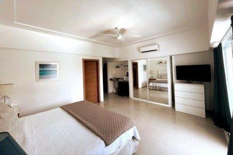 Postel nebo postele na pokoji v ubytování Elegante Aqua Marine Apartamento Juan Dolio
