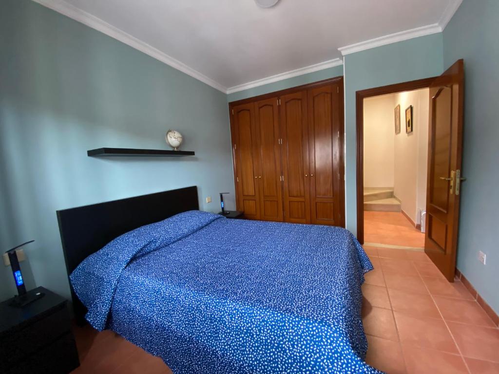 Postel nebo postele na pokoji v ubytování Villa Mogan Mall, con jacuzzi y PlayStation 5