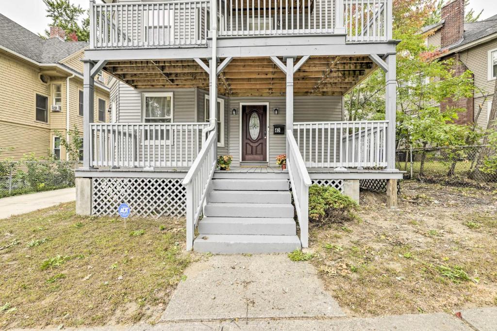 a house with a staircase leading to the front door at Cozy Springfield Apartment, Close to Parks! in Springfield