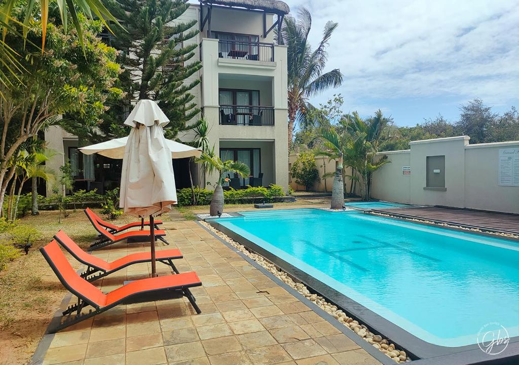 Bazén v ubytování Grand Bay Suites nebo v jeho okolí