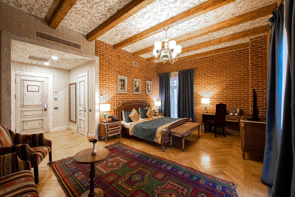 Postel nebo postele na pokoji v ubytování Sapphire Bayil Hotel