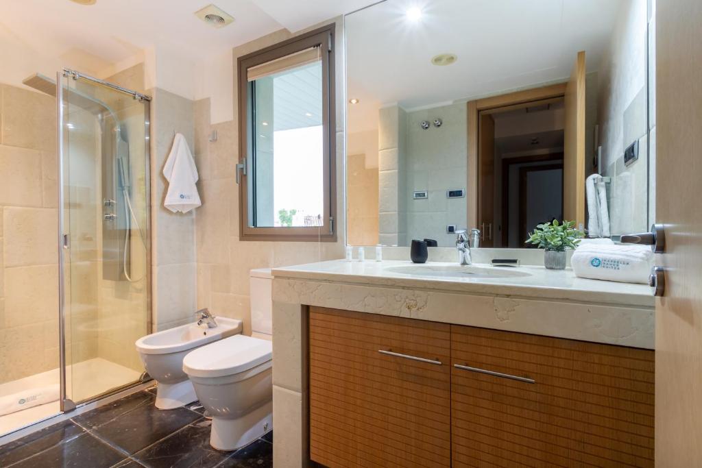 Kúpeľňa v ubytovaní MARBELLA BANUS SUITES - Jardines del Príncipe Golden Mile