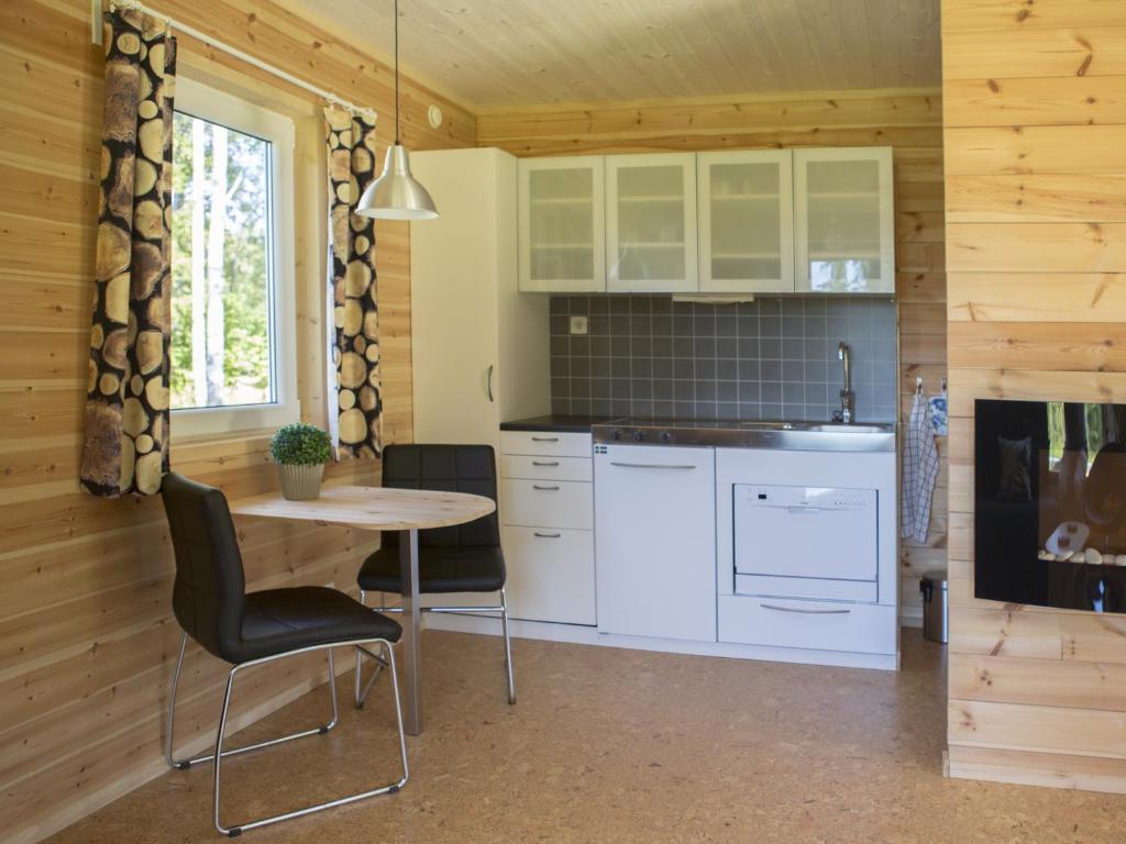 Kuchyň nebo kuchyňský kout v ubytování Hamgården Nature Resort Tiveden
