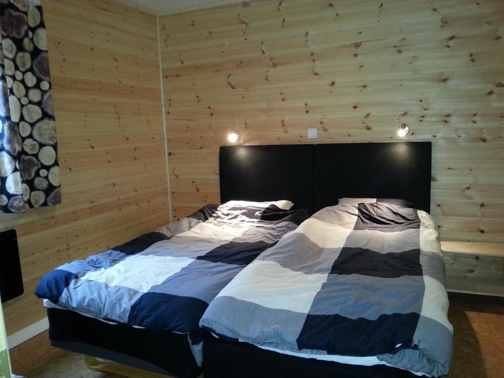 Postel nebo postele na pokoji v ubytování Hamgården Nature Resort Tiveden