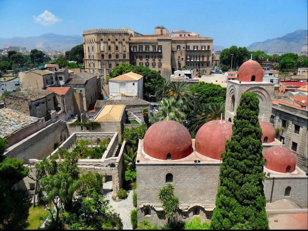 an aerial view of a city with red domes at AR Palace Hotel - Palermo in Isola delle Femmine