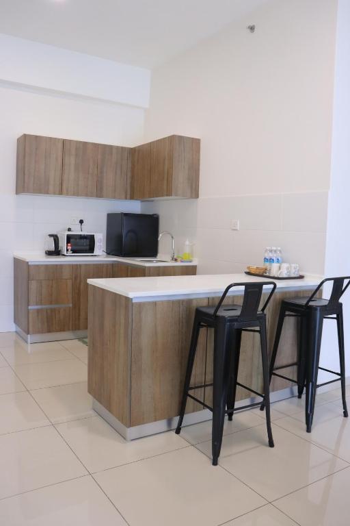 Kuchyň nebo kuchyňský kout v ubytování ATS Cameron Hotel & Apartments
