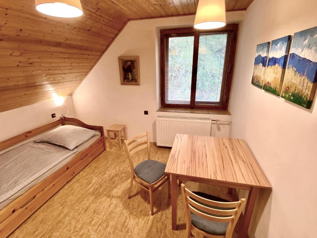 Postel nebo postele na pokoji v ubytování Ubytko Ivko