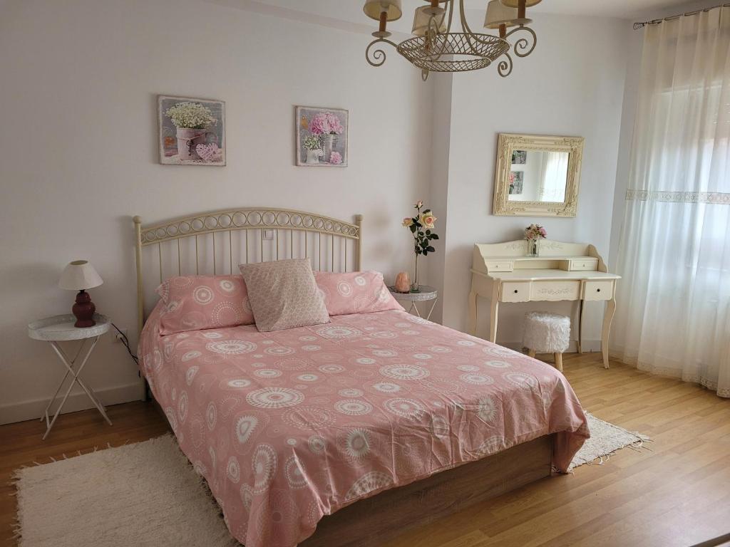 A bed or beds in a room at Piso Stylety Alcazar