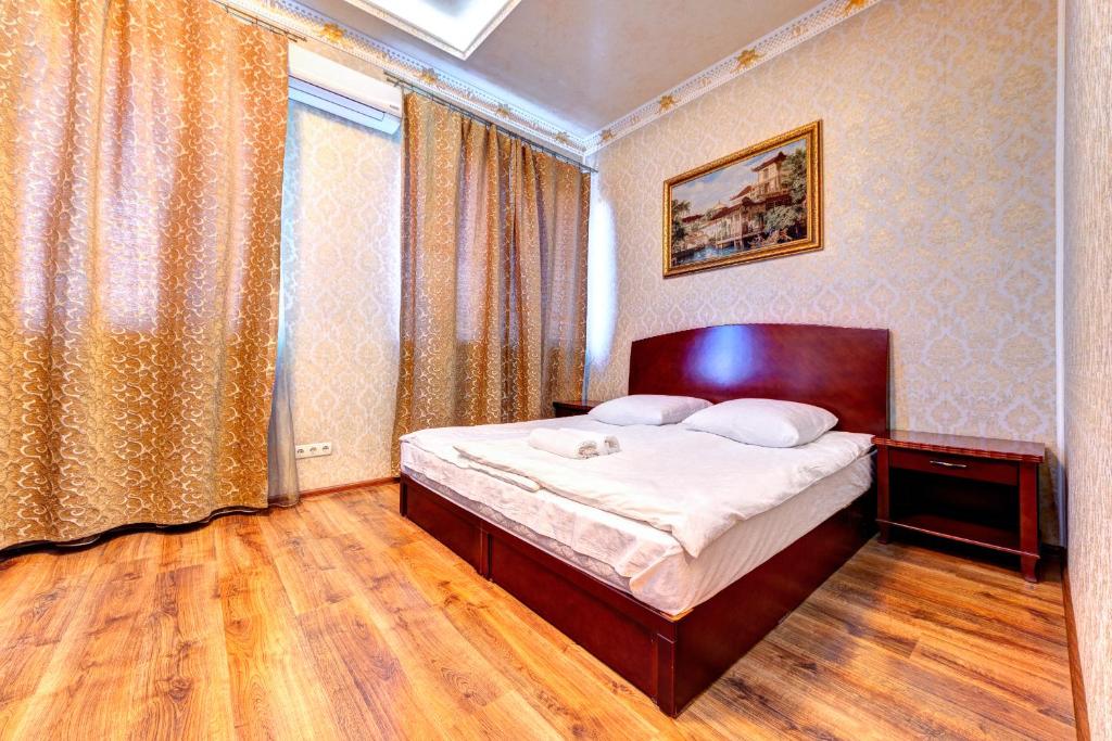 Postel nebo postele na pokoji v ubytování Hotel Kiev Lomakin