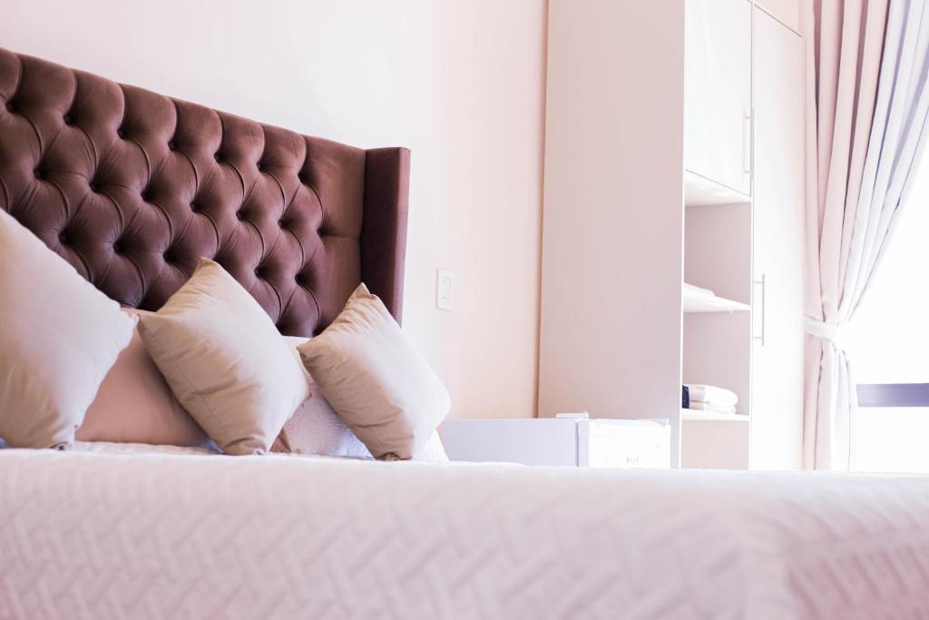 Postel nebo postele na pokoji v ubytování Liebling Hotel Ciudad del Este