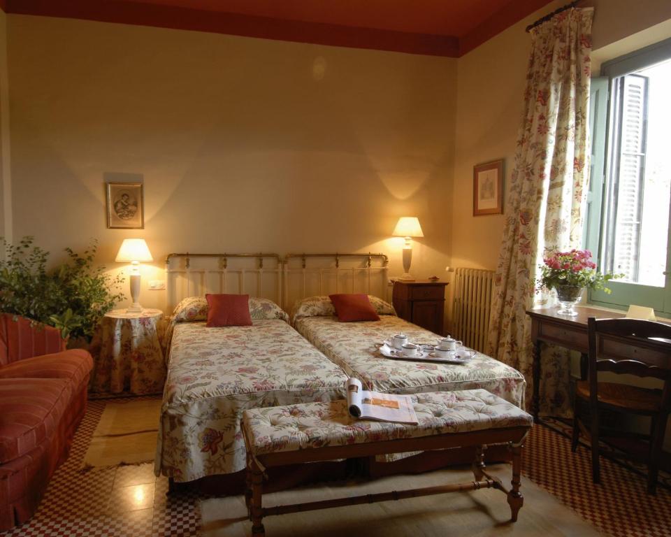 Postel nebo postele na pokoji v ubytování Hotel Caserío de Lobones