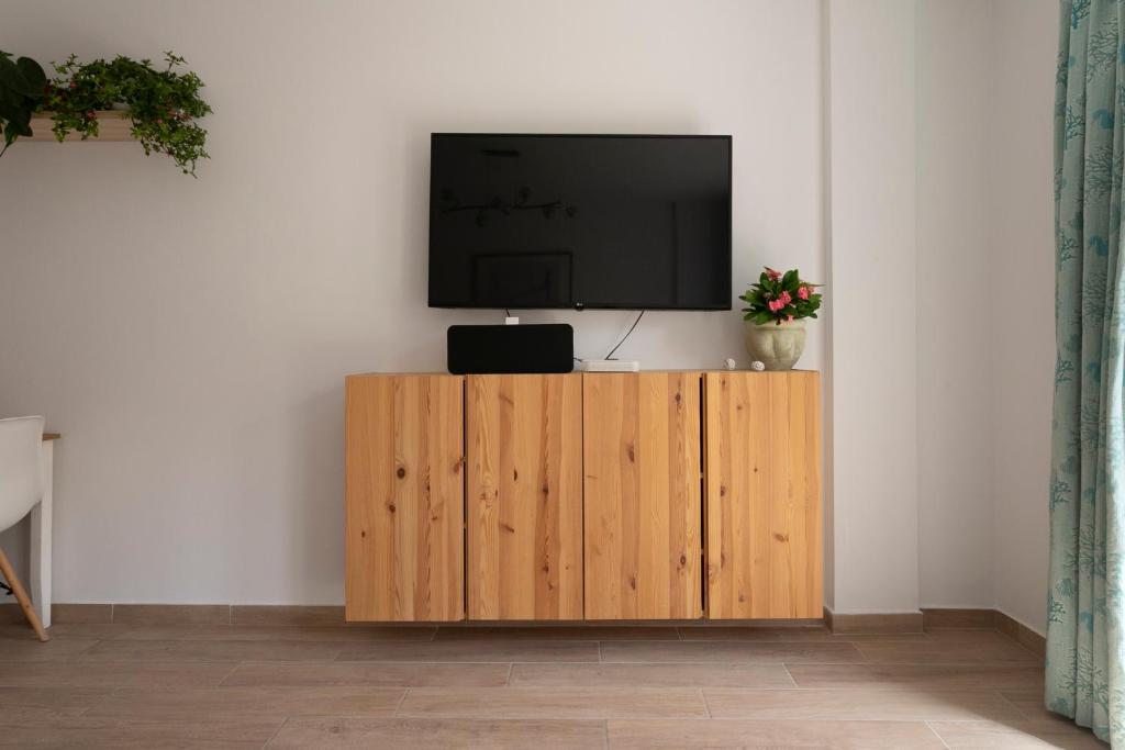 TV a/nebo společenská místnost v ubytování Casablanca House