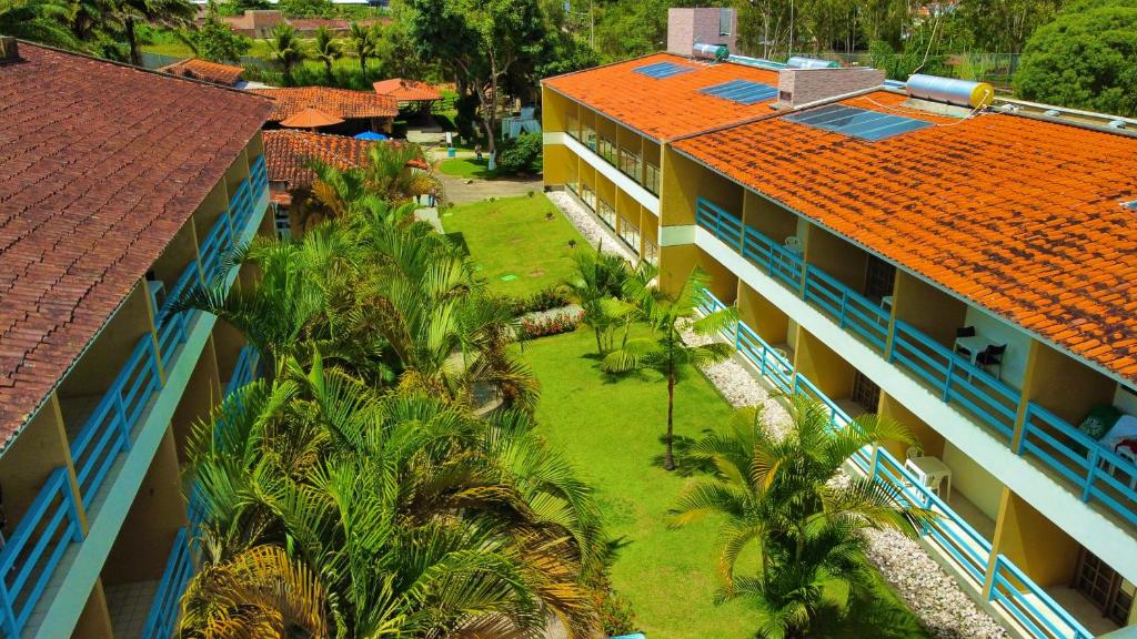 an aerial view of a building with palm trees at Bonito Plaza Hotel in Bonito