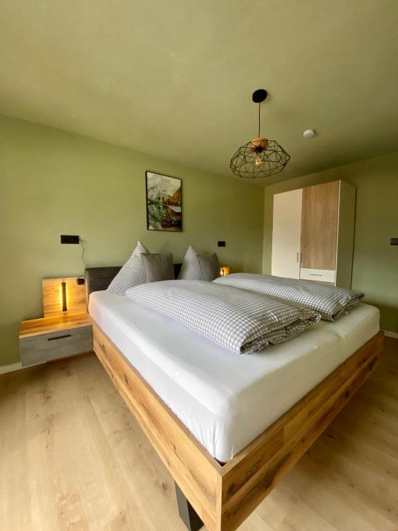 Postel nebo postele na pokoji v ubytování Haus Tirol Ehrwald