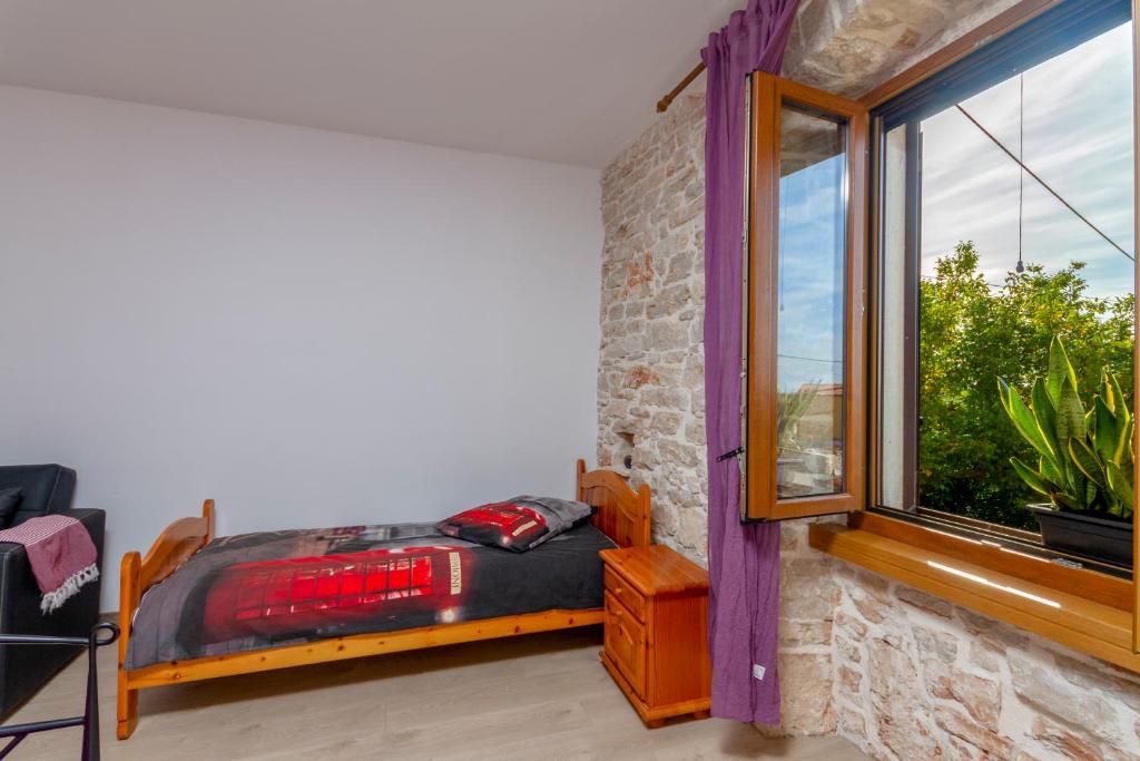 Posteľ alebo postele v izbe v ubytovaní Holiday stone house