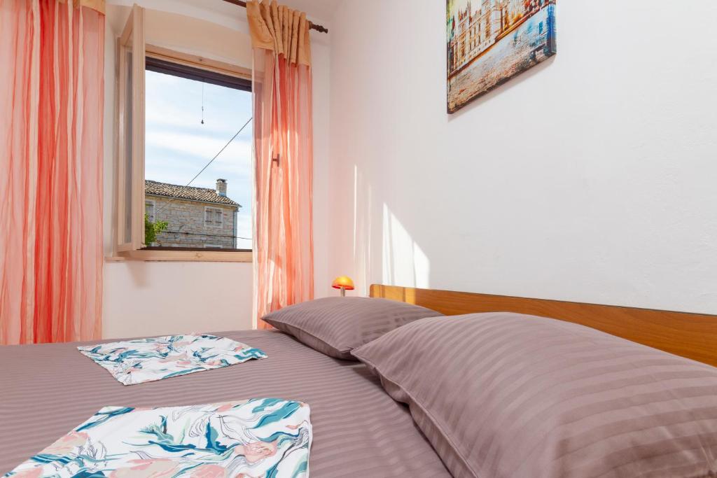 Posteľ alebo postele v izbe v ubytovaní Holiday stone house