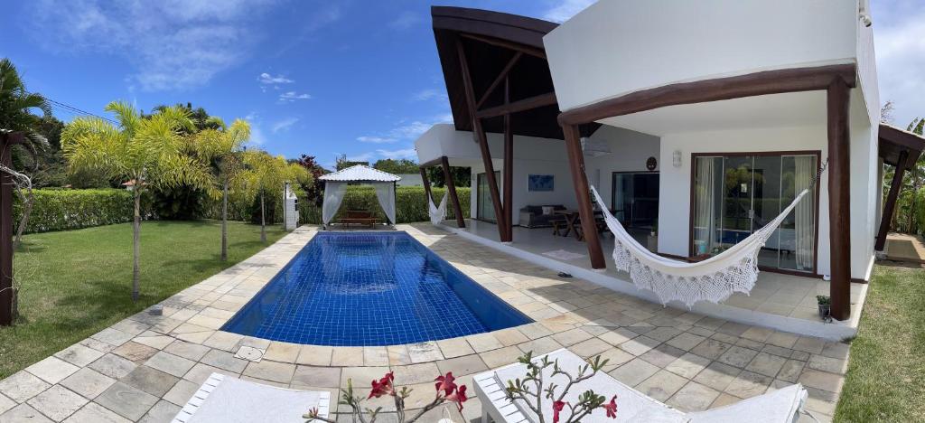 an image of a villa with a swimming pool at Casa Asa Delta - Pipa Natureza in Pipa