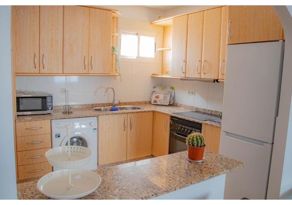 Kuchyň nebo kuchyňský kout v ubytování MojacarProperty, Apto Los Llanos
