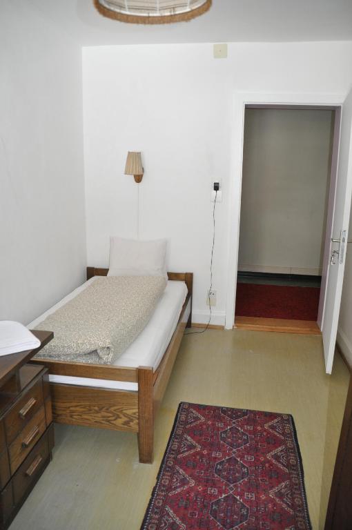 Postel nebo postele na pokoji v ubytování Hostel Engelberg "mein Trail Hostel"