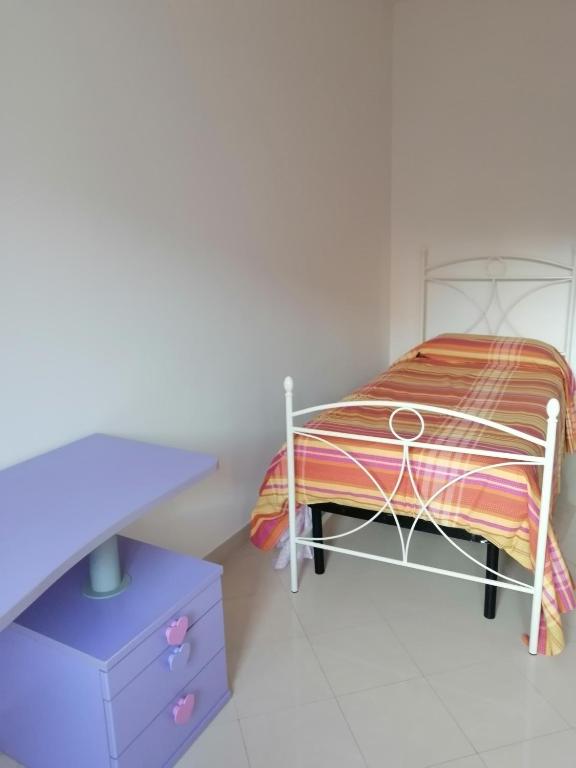 Posteľ alebo postele v izbe v ubytovaní B&B Nausica