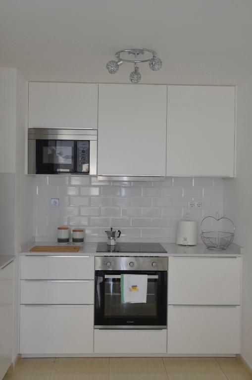 Kuchyň nebo kuchyňský kout v ubytování Casablanca House