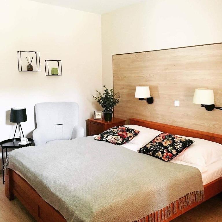 Postel nebo postele na pokoji v ubytování Hotel Pošta
