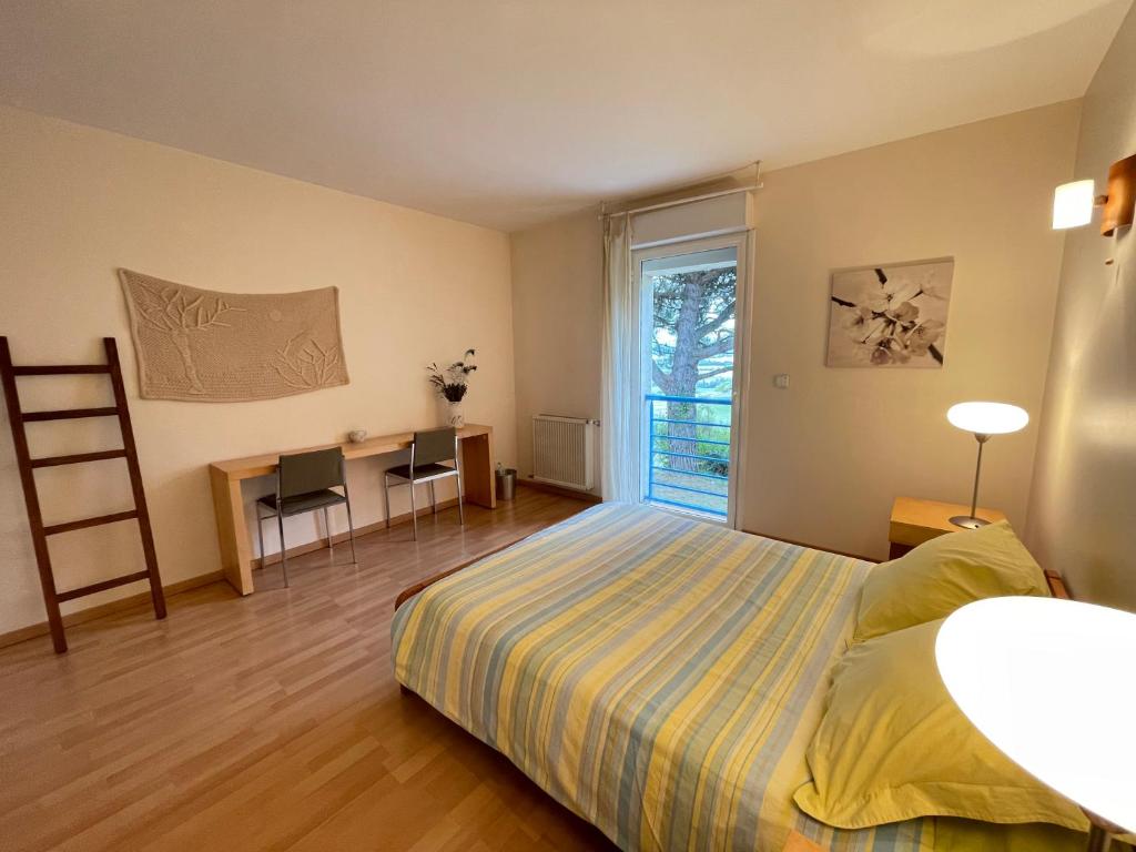 Postel nebo postele na pokoji v ubytování Les chambres de Testory