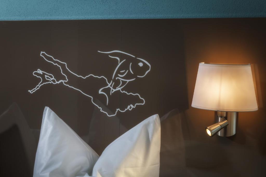 Postel nebo postele na pokoji v ubytování Hotel Schönau