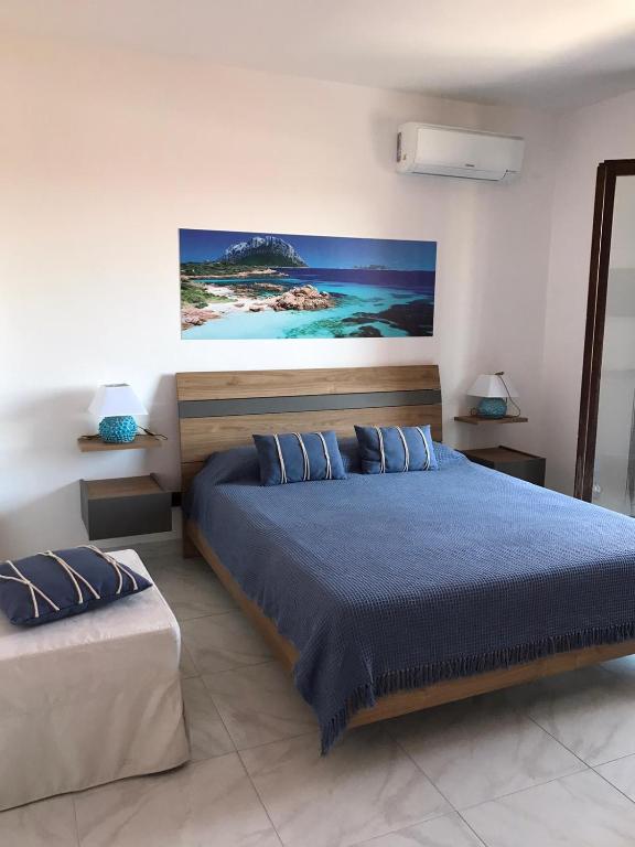 Postel nebo postele na pokoji v ubytování B&B I Colori Dell'Isola