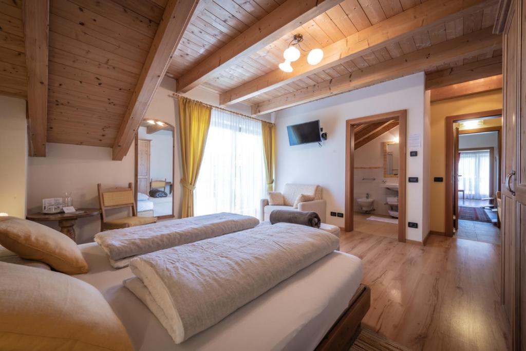 Postel nebo postele na pokoji v ubytování Les Gomines BB*****
