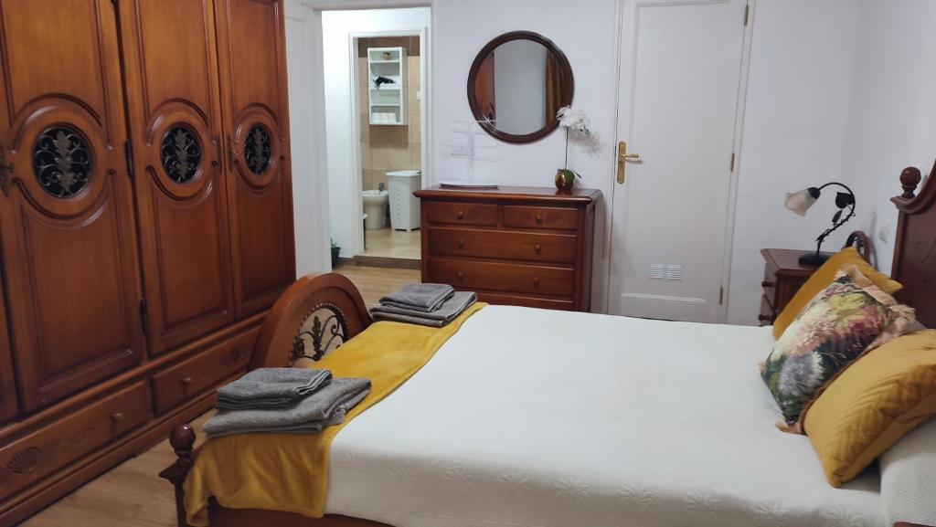 Postel nebo postele na pokoji v ubytování Casa" VISTAS AL TEIDE" mar Piscina privada parking cubierto gratuito en las instalaciones