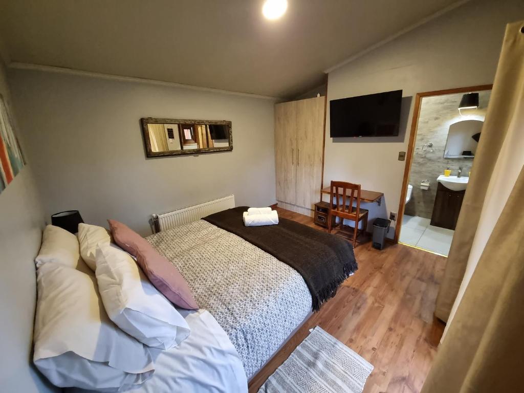 Postel nebo postele na pokoji v ubytování Hostel Torobayo