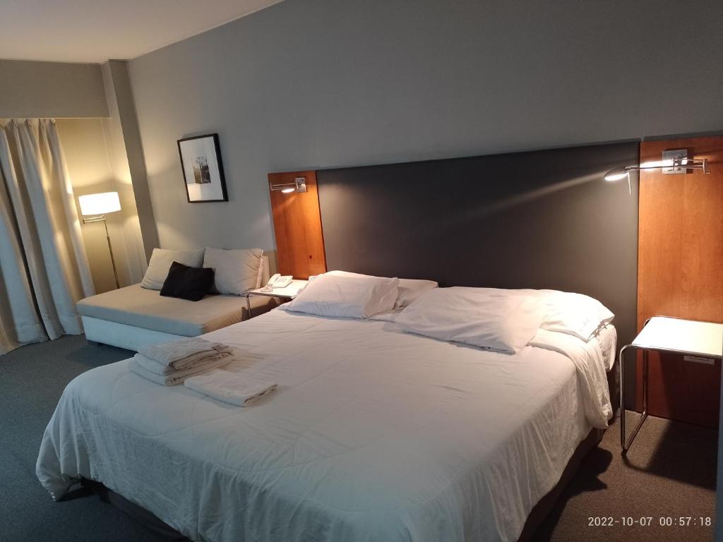 Ένα ή περισσότερα κρεβάτια σε δωμάτιο στο Buenos Aires Apartamento